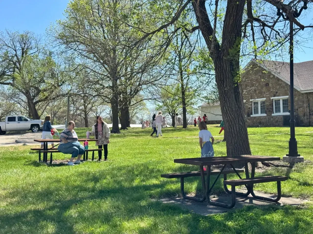 Families at the community egg hunt in the park