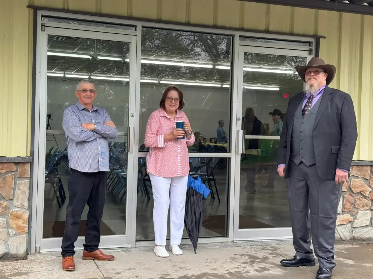 Church members visiting outside the church entrance