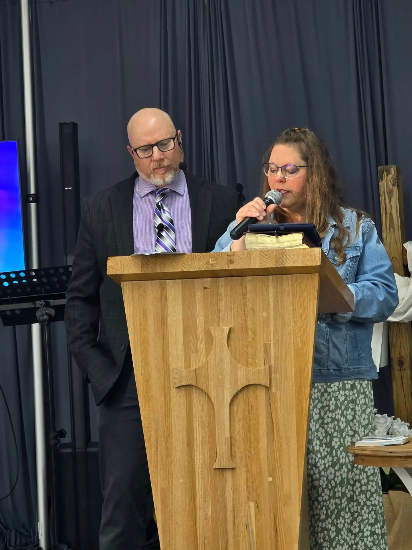 Pastor Mike and Linda Mattox ministering from the pulpit